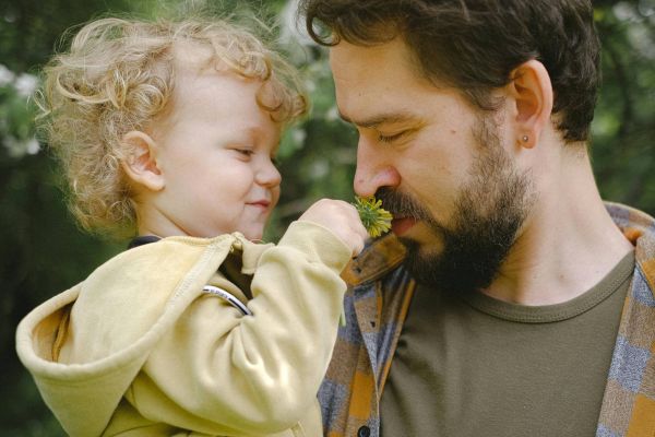 Man holding young boy